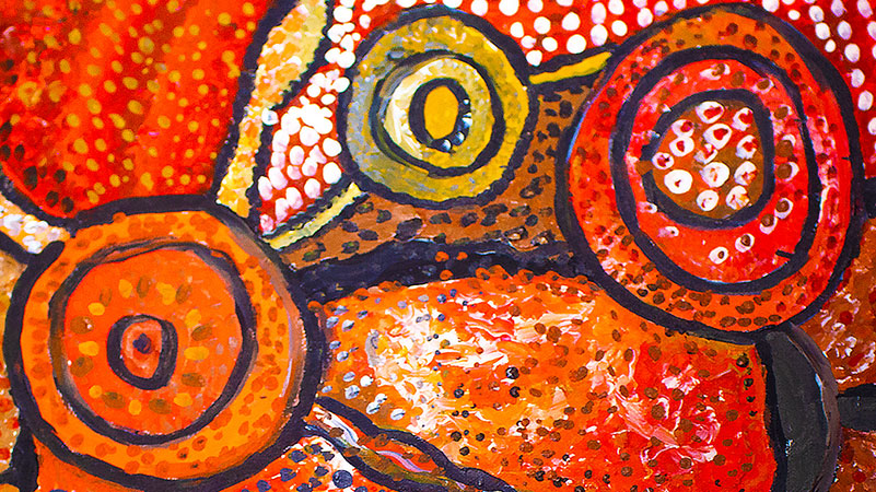 Aboriginal artwork on the cover of the Aboriginal Justice Agreement document